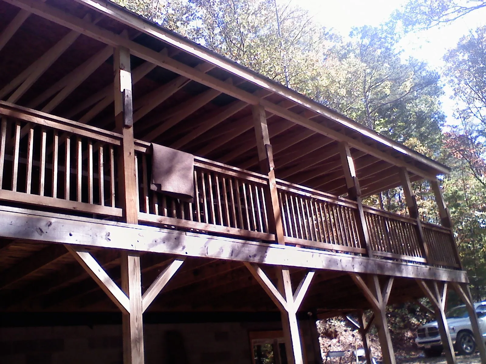 Timber framing under a new elevated porch and deck — Roof Leak Repair in East Bridgewater by Roofing Brothers